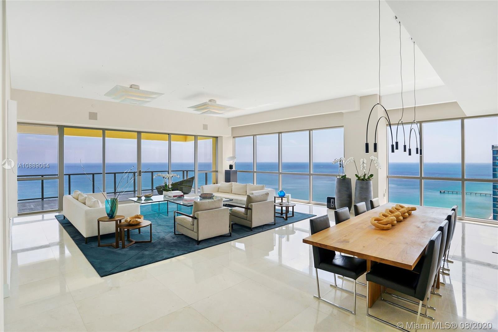 STEP INSIDE TO THE MOST LUXURIOUS TOWER IN SUNNY ISLE,  MANSIONS OF ACQUALINA, THIS FULLY TURNKEY  RESIDENCE #3202 BRING ONLY YOUR TOOTHBRUSH, HAS ENDLESS SOUTH & NORTH COASTLINE VIEWS OF THE OCEAN AND OVER LOOKS TOWARDS DOWNTOWN FROM THE WEST BALCONIES.  BREATHTAKING BEAUTIFUL ATTENTION TO DETAIL FEATURING 4609 SQ.FT 3BED PLUS FAMILY PLUS SERVICE & 6.5 BATHS, DIRECT OCEANFRONT, HAS PREFERRED SOUTHERN EXPOSURE, INCLUDING PRIVATE JACUZZI, &OUTDOOR SUMMER KITCHEN.  PRIVATE ENTRY FOYER WITH 12FT CEILINGS, SPACIOUS LIVING AREA & MASTER SUITE, INCLUDES HIS & HER MASTER BATHS, FIREPLACE & MORE.  ENJOY 5 STAR AMENITY SERVICES  INCLUDES A "ROLLS ROYCE HOUSE CAR, COMPLIMENTARY BREAKFAST , FULL HAMMAM , SPA, BEACH CLUB SERVICES, YOGA, CIGAR LOUNGE,  LUXURY CONDO LIVING AT ITS BEST IN SOUTH FLORIDA.