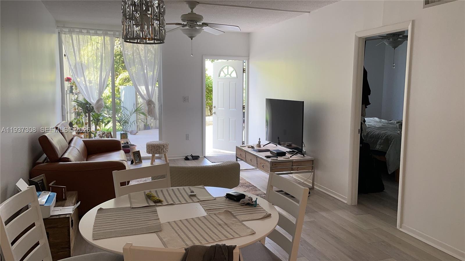 The apartment is furnished and everything is in excellent working order. It includes a laundry room in the unit, a new refrigerator, vacuum cleaner, coffee maker, and access to a swimming pool in the complex.  There's also a private patio with a barbecue and a smart TV.