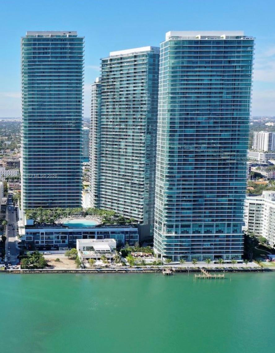 Enjoy this beautiful 2 bedrooms, 3 bathrooms unit at Paraiso Bay. Open balcony with amazing water view of Biscayne Bay. European kitchen style, Bosch appliances and modern cabinets. Floor to ceiling impact glass windows. High-end amenities such as stunning 100 feet swimming pool overlooking the bay, tennis court, spa, bowling alley, cigar and wine room, kids playroom, movie theater, State of the art Gym and treatment rooms. What is more, a private club for residents at the exclusive AMARA restaurant by Michael Schwartz. For your convenience it is only 15 minutes from Miami Beach, easy access to I-95, downtown Miami & Brickell. Close to wonderful restaurants, shopping & Miami District Design. Unit rented until December, 2026