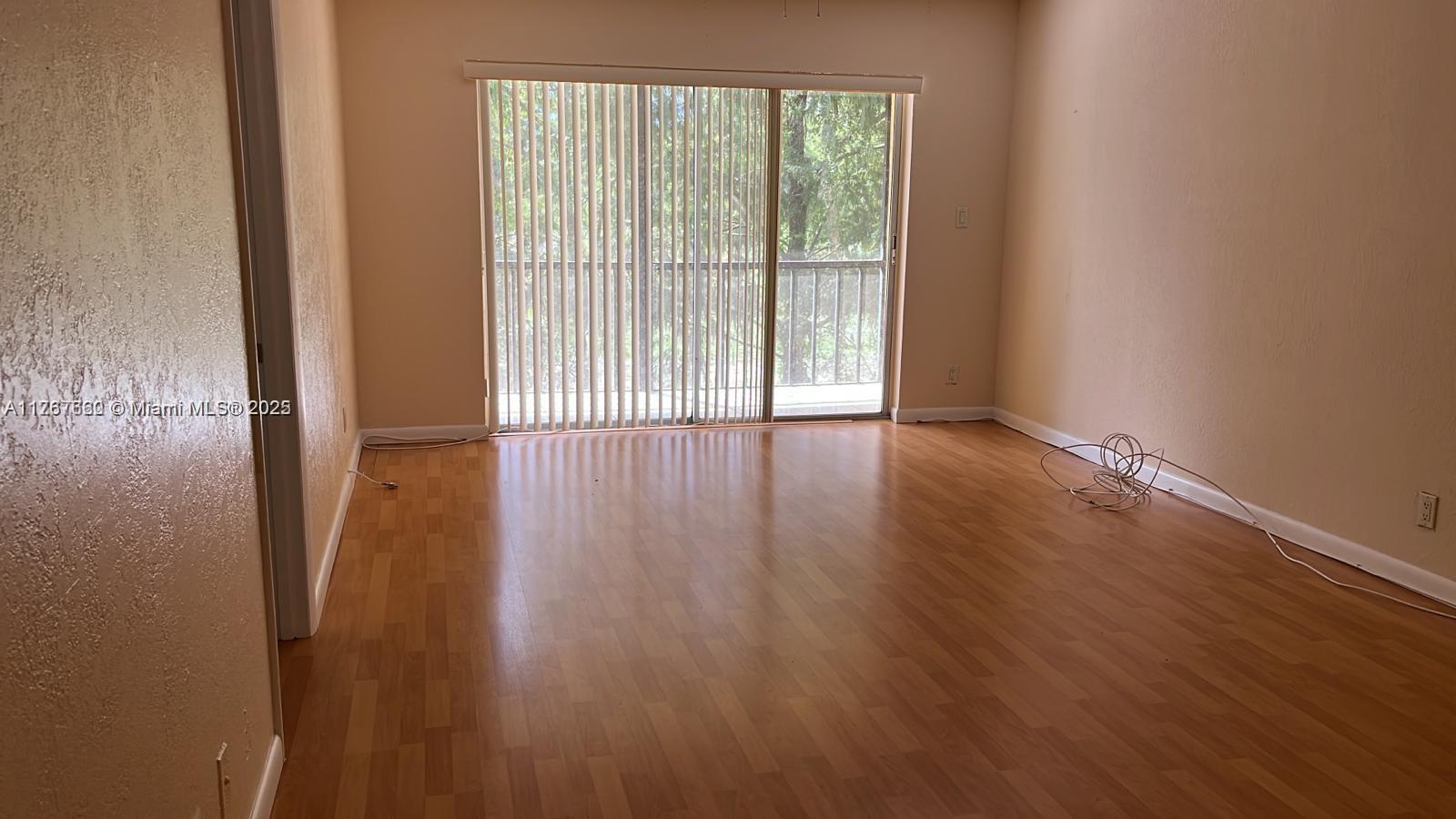 Discover this beautifully maintained 1-bedroom, 1.5-bath condo with serene lake views, located in a gated community in the heart of Tamarac. This inviting unit features tile flooring throughout, with an open floorplan. The building exterior has been freshly painted. Residents enjoy access to swimming pool, a clubhouse, tennis and basketball courts, a fitness center, and a peaceful picnic area. The location is unbeatable—just 20–25 minutes to the beach, Fort Lauderdale International Airport, and Sawgrass Mills Mall, with easy access to major highways including I-95, the Turnpike, I-75, and the Sawgrass Parkway. Low HOA. Investor friendly