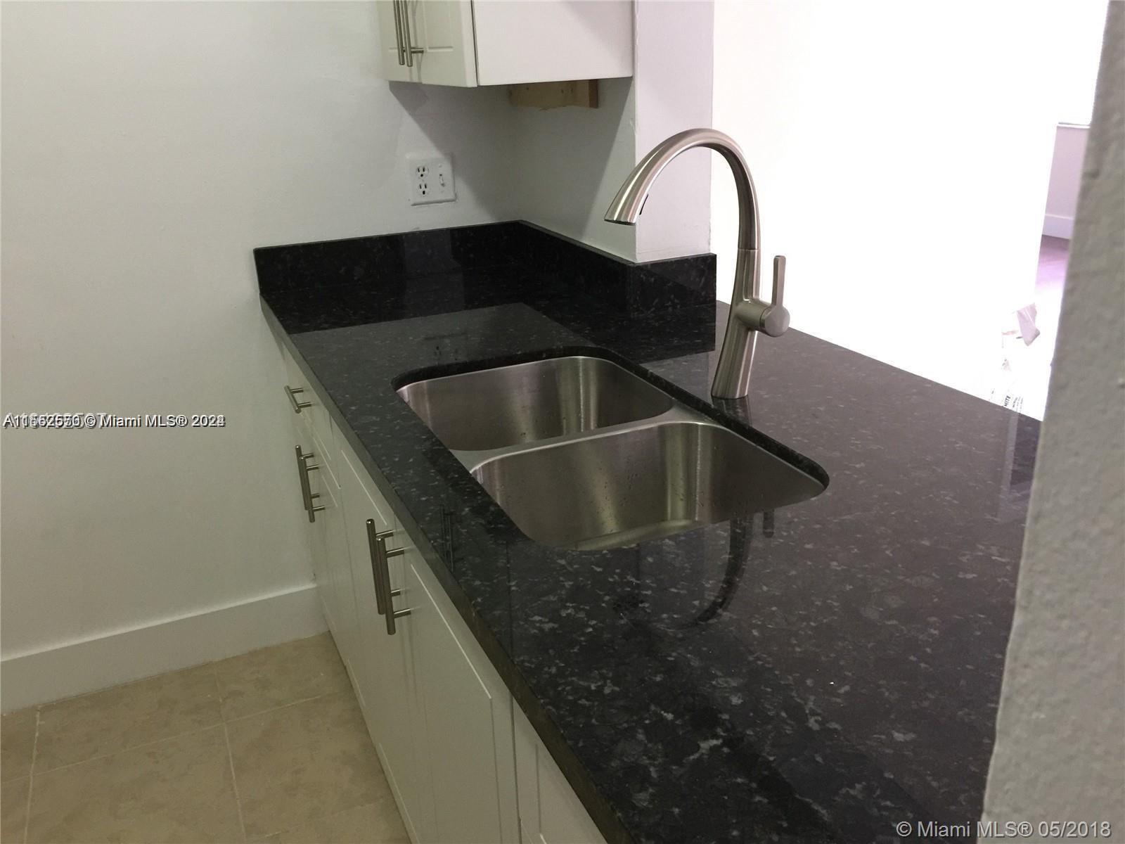 LAGO GRANDE CONDO THREE B - Residential Lease