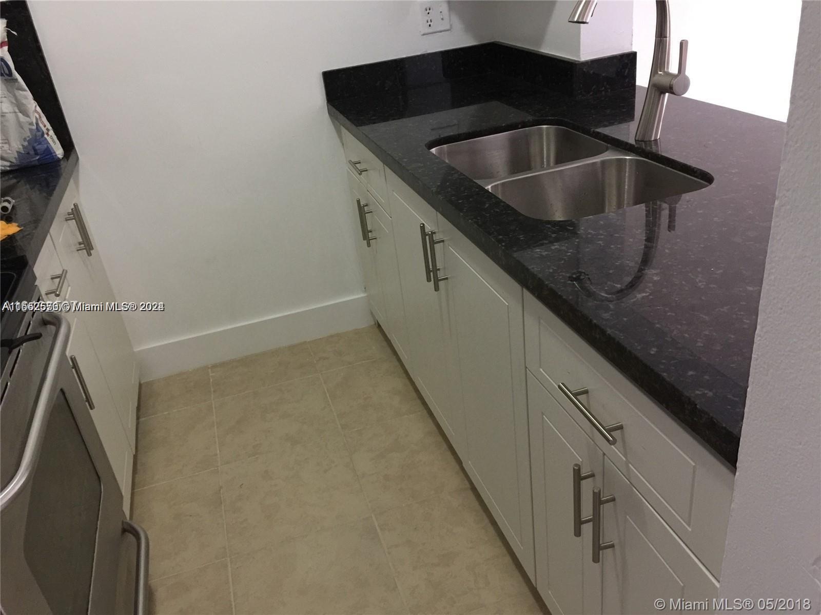 LAGO GRANDE CONDO THREE B - Residential Lease