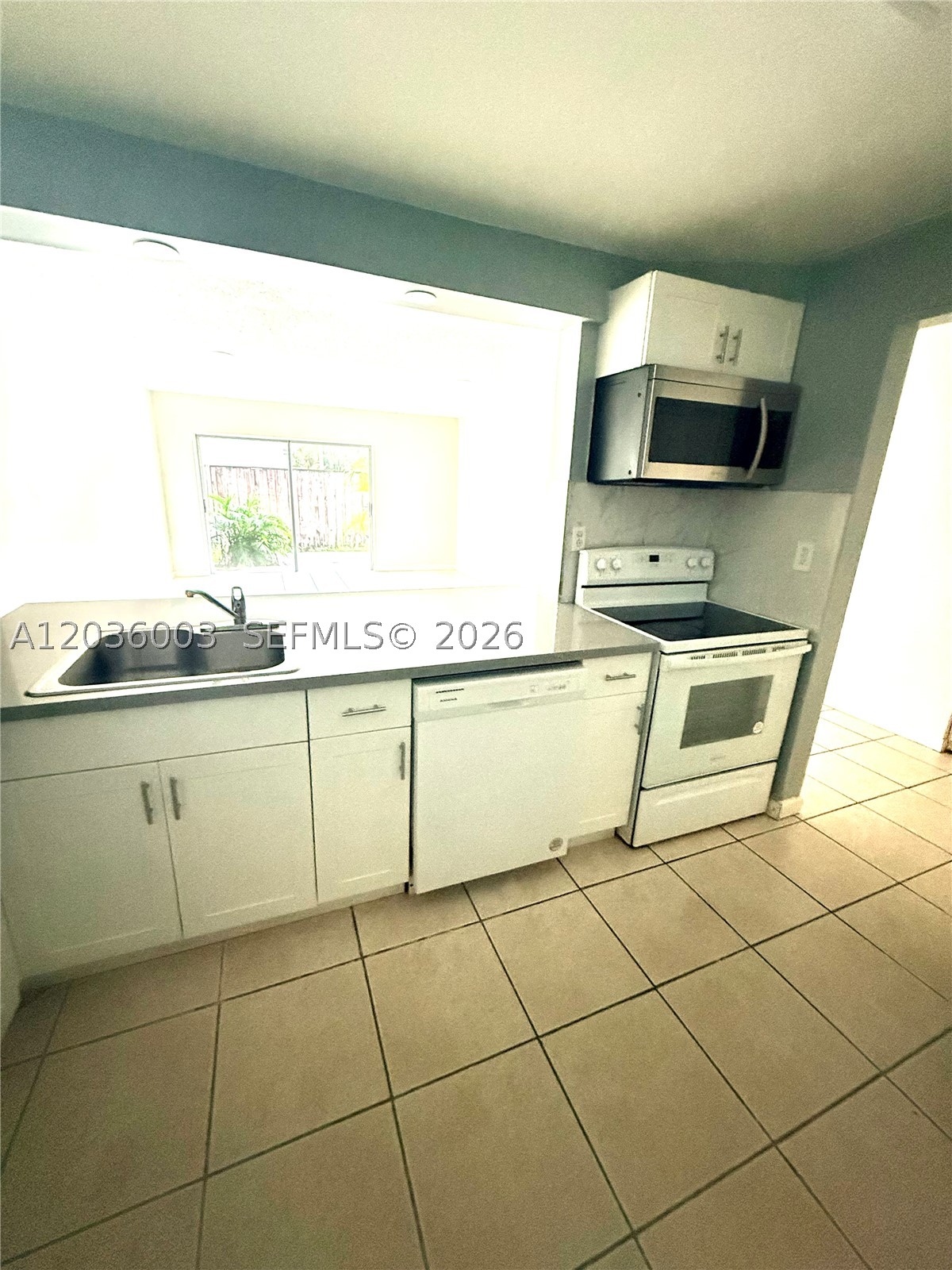 WOODSIDE IN KENDALL CONDO - Residential