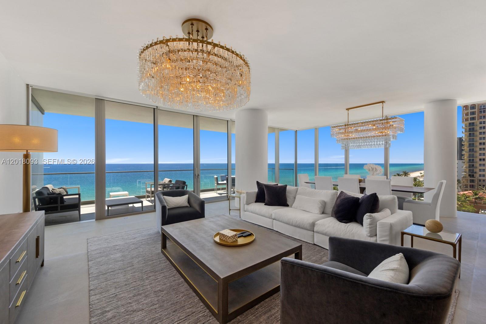Luxury oceanfront living reaches new heights in this stunning half-floor corner residence designed by Enrique Norten. This near 3,000 SF South Corner flow through residence features three bedrooms, three and a half bathrooms, a media room, and two expansive terraces with sweeping ocean and sunset views. A private elevator opens to Boffi kitchens, Gaggenau appliances, and elegant B&B Italia bathrooms. Resort-caliber amenities include sunrise and sunset pools, full-service beach, spa, and Minotti-designed lounges. Minutes from Shell Bay Club, Aventura Mall & Bal Harbour Shops— this is brand new luxury at truly remarkable value.