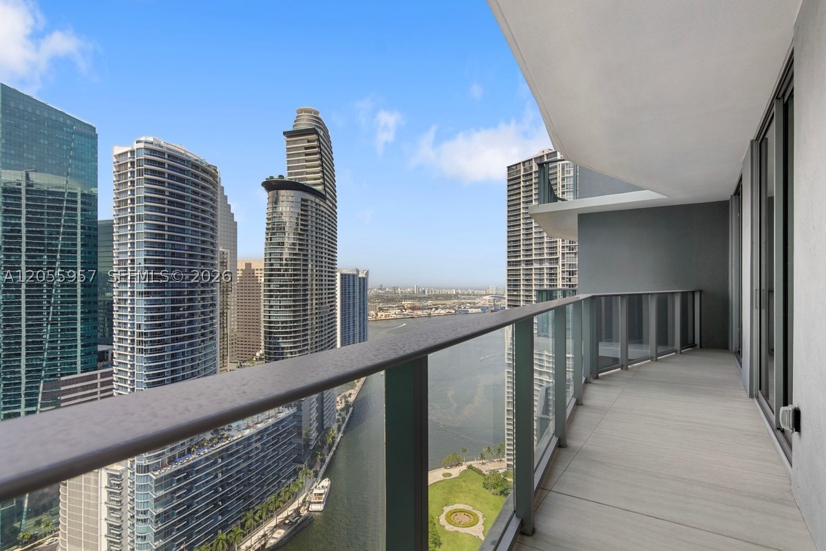Residence 3902 at Viceroy Brickell offers sophisticated high-rise living with sweeping views of the Miami River, Biscayne Bay and the Brickell skyline. This beautifully finished 2-bedroom, 2-bath residence features 1,286 interior square feet, a 161-square-foot balcony, high ceilings, expansive glass and illuminated walk-in closets in both bedrooms. Designer interiors by Meyer Davis Studio include smart keyless entry and an open gourmet kitchen with Italian cabinetry, quartz countertops, a porcelain backsplash, premium Bosch and Fisher & Paykel appliances and a spacious island with seating. Spa-inspired bathrooms feature custom Italian cabinetry, frameless glass showers and Brizo fixtures with gold finishes. The living room and primary bedroom are furnished, while the second bedroom offers flexible use. Residents enjoy five-star Viceroy hospitality, a staffed lobby, resort-style pool deck, restaurant and bars, fitness center, sauna, game room, golf and Formula 1 simulators, valet, concierge and Grand Bay Club membership. Owners also receive preferred rates and exclusive benefits at Viceroy Hotels & Resorts worldwide, extending the Viceroy lifestyle beyond the residence.
Ideally located near the Miami River, Brickell City Centre and Brickell’s premier dining, shopping and business destinations.