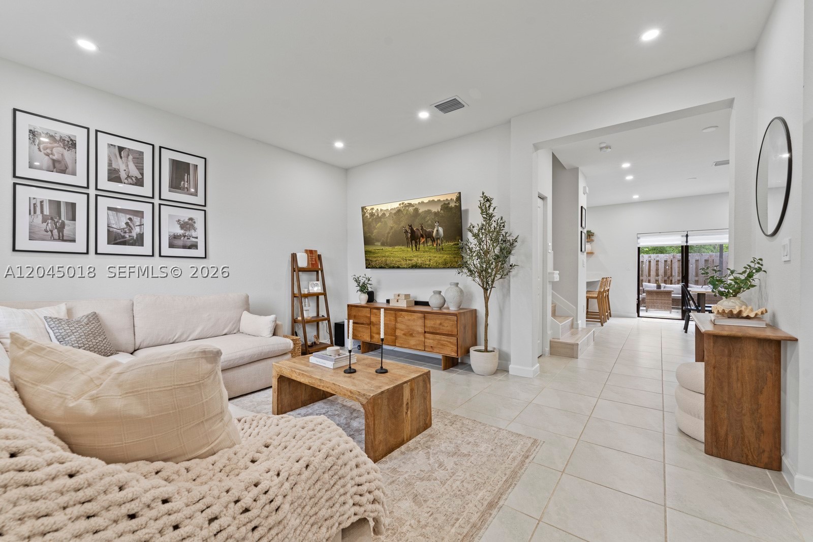 Welcome to this beautiful, turn key 2-story home with 3 beds, 2.5 baths in the community of Crystal Cay. This spacious and homey abode features dedicated living, family, and dining areas, a sleek kitchen with stainless steel appliances, elegant zebra window treatments, and a convenient laundry station. Upstairs boasts 2022 waterproof luxury vinyl and all 3 generously sized bedrooms. The primary bedroom has water views and hosts an ensuite and walk-in closet. Step outside to your privately fenced backyard with a pergola. The perfect space to entertain and barbecue with the family! Jog or walk along the waterfront trail just steps away. Enjoy the community's amenities at the Clubhouse, which include a pool, gym, and party room with a kitchen. Situated near shopping and dining options as well as Black Point Marina for the water lovers! 2 parking spaces included.