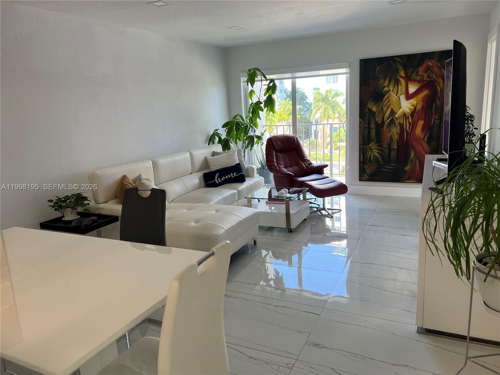 1/1 and 1/2 turned into a 2/1 and 1/2 with Permits and Plans Approved by the City Hall *** Totally and Newly Renovated with Built in Closets in both Bedrooms * Open Kitchen ***Impact Windows/ Door *** and Shades for your comfort *** Ocean View from the Balcony *** Half Block from Beautiful Beaches *** Close to Supermarkets. Pharmacy and 20 min to Miami International Airport *** Come and See it for Yourself *** Look no Further!