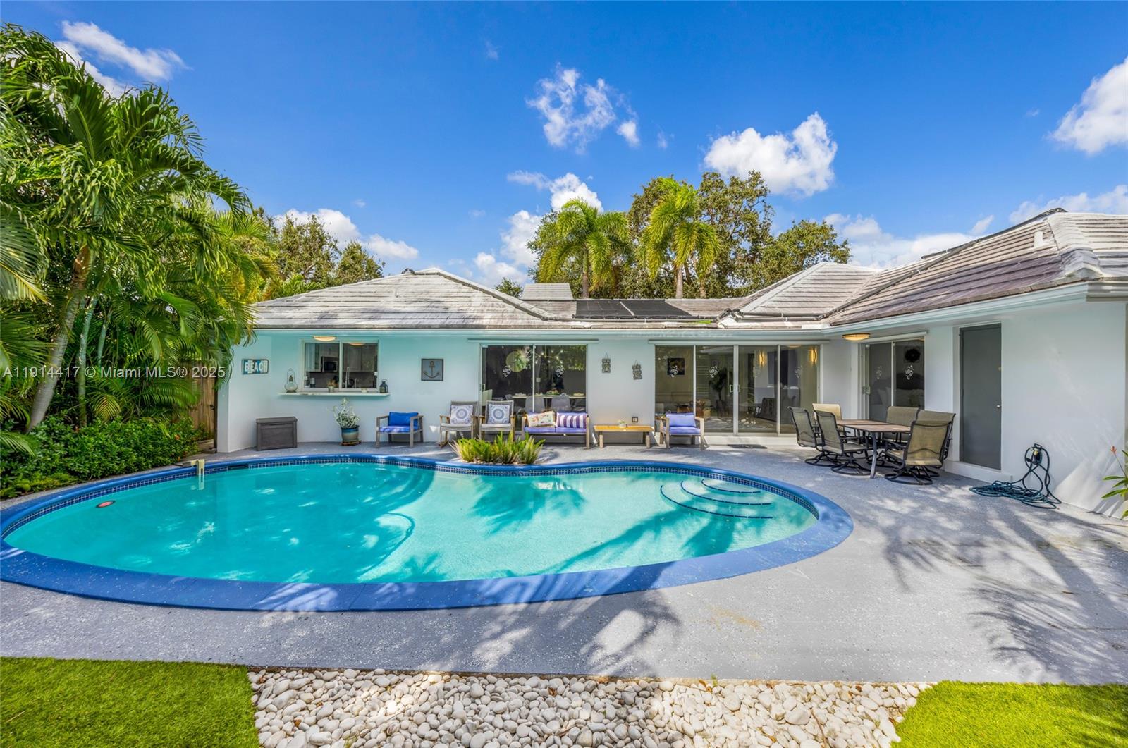 Step into tropical living in the heart of Imperial Point. This spacious 3 bed & 2 bath sits on a corner lot, offering a rare combination of indoor comfort and outdoor rector-style entertaining space. Tons of natural light flooding in with expansive windows that look out to the backyard. Gourmet kitchen features high-end touches like quartz counters, custom cabinetry, and walk-in pantry, with large laundry room and side yard perfect for pets or extra storage. With the corner lot, you get enhanced side yard space and added privacy. Quick access to the beach, premium dining & shopping nearby, minutes away from major roads - making this the perfect fit for a Florida lifestyle!