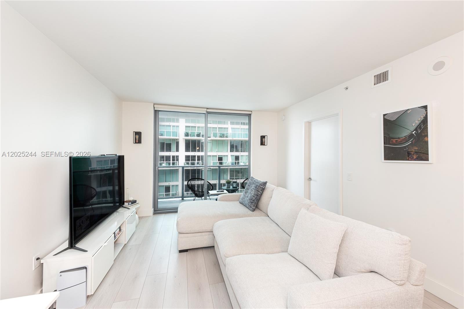 Stylish 1-bed, 1.5-bath + den in the heart of Brickell. This 710 sq ft residence at MyBrickell Condo has been thoughtfully updated with new flooring, modern lighting, and contemporary finishes. Open city and river views, plus unbeatable walkability to restaurants, shops, cafés, and the Metrorail. Building amenities include a fully equipped gym and brand-new rooftop pool. With up to 12 rentals per year allowed. Currently leased at $2,800/month until September 1, 2026.