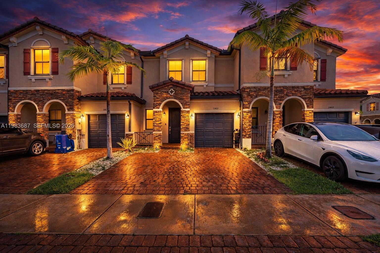 REDUCED FOR QUICK SALE! This fully revamped townhouse blends sleek, modern style with cozy comforts in a thriving neighborhood. Bright, ceramic tiles will lead you through an open living area freshly painted in soft, inviting hues. Upstairs, generous bedrooms offer plenty of room to unwind, each outfitted with ample closets and designer touches. Outside, your private backyard oasis awaits—perfect for gatherings, weekend barbecues, or a quiet morning coffee under the insulated roof, shielding you from the South Florida sun. All this awaits in a peaceful community just minutes from top schools, parks, shopping, and easy highway access. Move-in ready and thoughtfully detailed at every turn, this home is more than a listing—it’s the lifestyle you’ve been dreaming of! Schedule your tour today.  Home is currently rented  for $2850.00 with awesome tenants.
