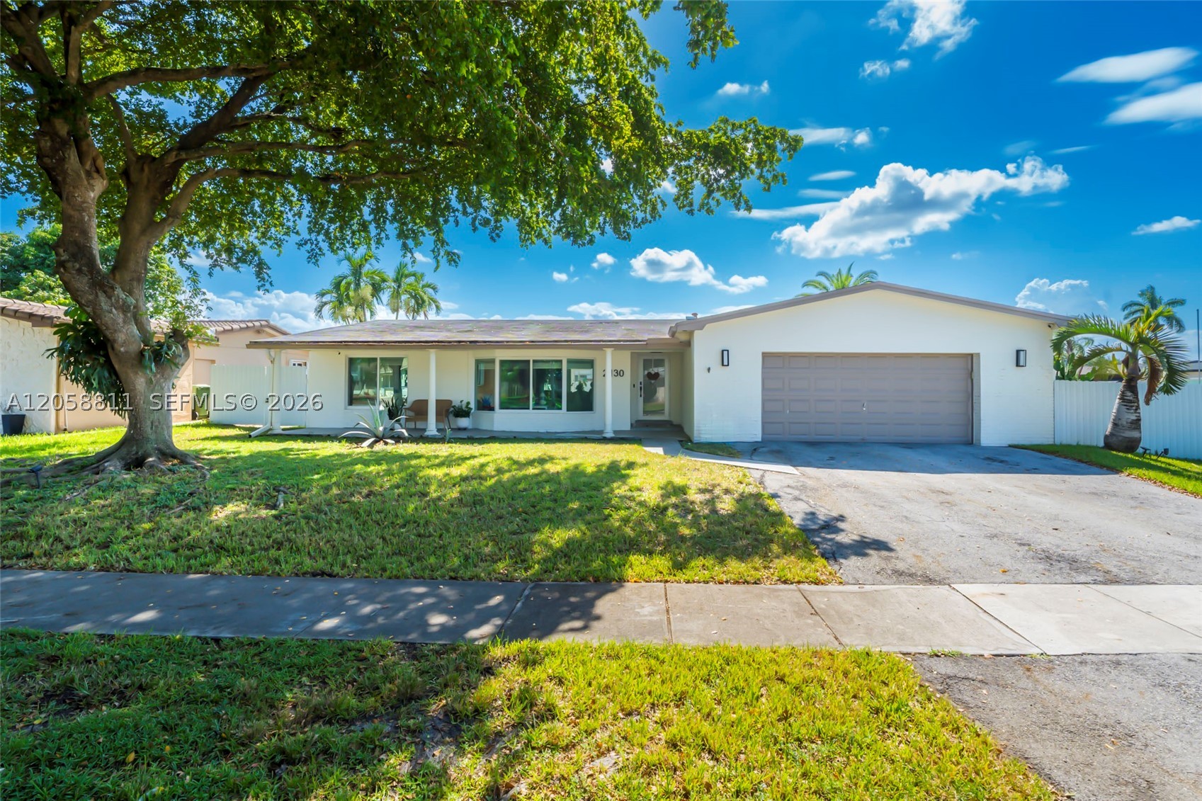 Welcome to this beautifully updated 4-bedroom, 3-bathroom home in the highly sought-after Pembroke Lakes community! Situated on a spacious corner lot, this move-in-ready residence offers the perfect combination of style, functionality, and outdoor living. Inside, you'll find a thoughtfully renovated kitchen featuring modern finishes, ample cabinetry, and an open layout that flows seamlessly into the main living and dining areas, ideal for both everyday living and entertaining. Impact windows provide peace of mind while filling the home with natural light, and the well-designed floor plan offers generous living spaces for the entire family. Step outside to the expansive screened-in patio, the perfect place to enjoy South Florida living year-round, overlooking a fully fenced backyard with plenty of room for pets, play, or even a future pool. Conveniently located in the heart of Pembroke Lakes, this home is just minutes from top-rated schools, parks, shopping, dining, golf courses, and major highways, offering an unbeatable combination of comfort, convenience, and lifestyle. Don't miss this opportunity to own a beautifully updated home in one of Pembroke Pines' most desirable neighborhoods!