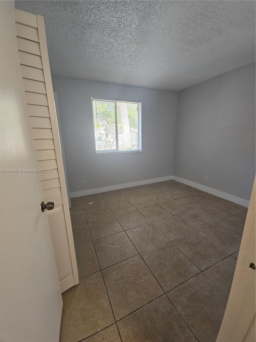 GARDENS NORTH ELEVEN COND - Residential Lease
