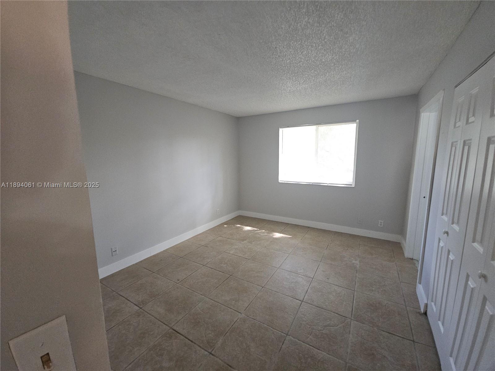 GARDENS NORTH ELEVEN COND - Residential Lease