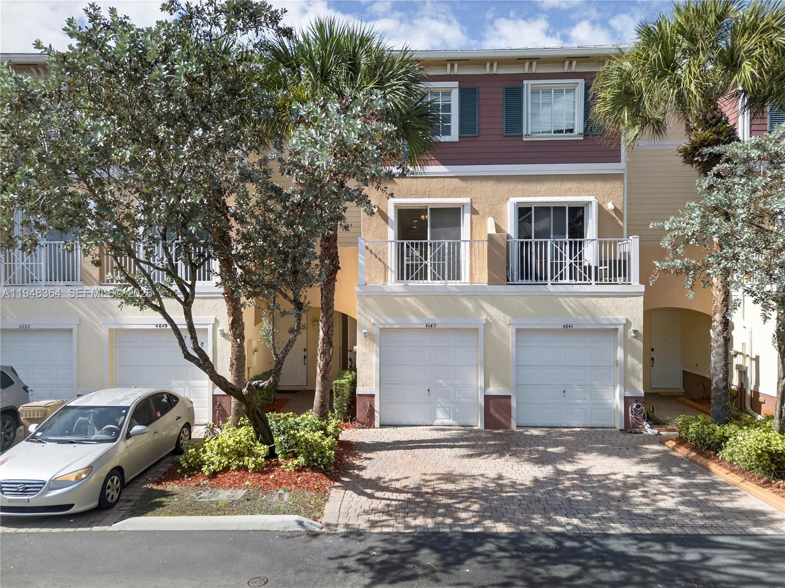 Rarely available tri-level townhome in the heart of Davie! This beautifully updated 3 bedroom 2.5 bath residence features 1 car garage and thoughtfully designed open concept. First floor offers spacious living & dining areas, a modern kitchen and convenient 1/2 bath-perfect for entertaining. The entire second floor level is dedicated to the primary suite w/ its own balcony. Third floor offers two additional bedrooms, a full bath and laundry room. Step outside to a backyard patio ideal for relaxing, gardening and taking in sunset views with the privacy of no neighbors behind. Located within walking distance to the community pool & play area, centrally positioned near top-rated schools, colleges, shopping, dining and entertainment. Easy association approval. Pet friendly w/ breed restrictions. Don't miss this exceptional opportunity!