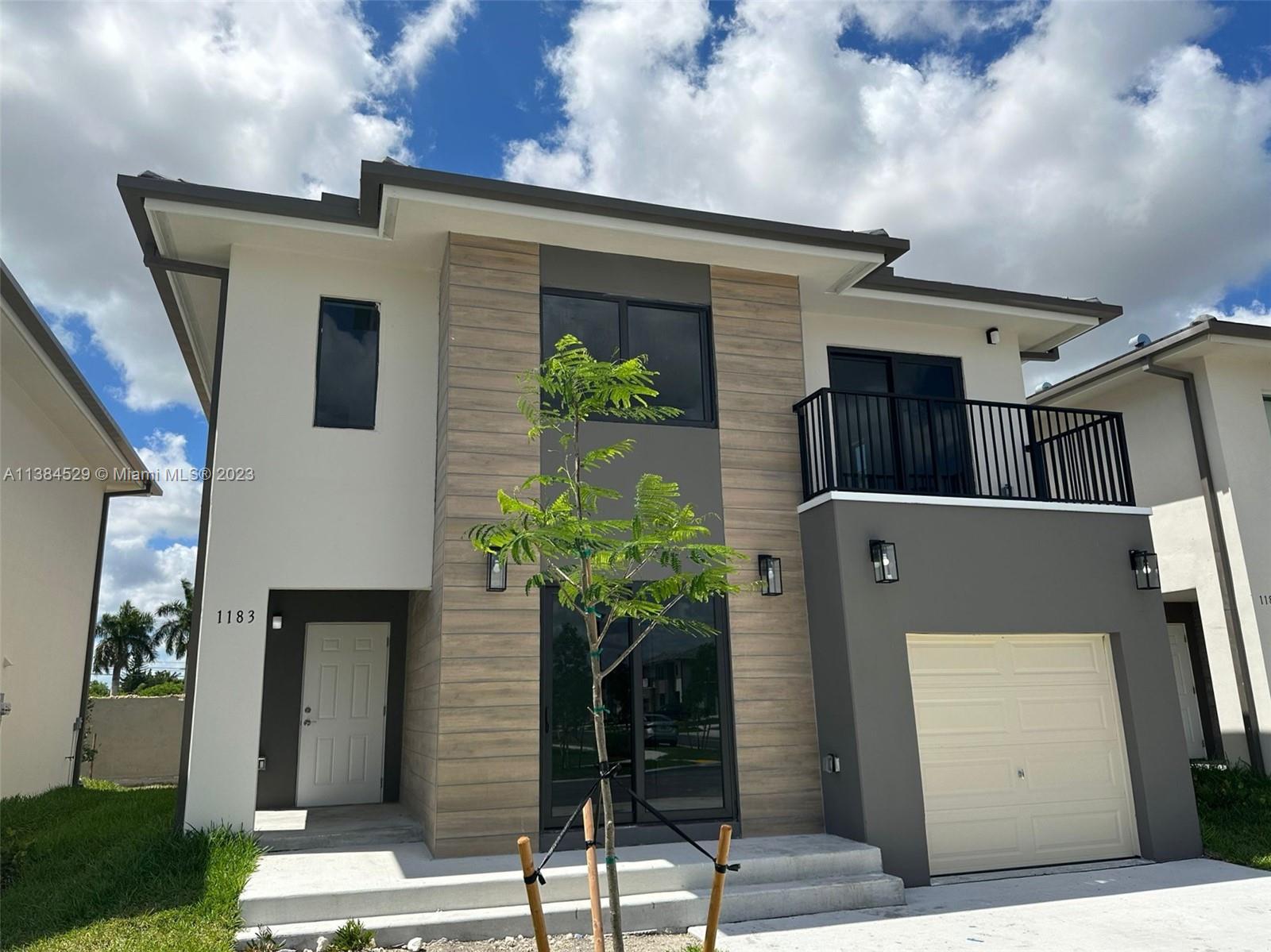 BEAUTIFUL NEW CONSTRUCTION, 2 story home, 5 beds 4.5 baths, garage & fenced backyard. Located in a great residential community in Florida City. Beautiful open kitchen with s/s appliance, stone counter top, double sink. Front load full side washer & dryer. Title flooring throughout the house, impact windows. This house offers a full bedroom with closet & bathroom downstairs . Master room with walking closet and double sink in bathroom. Excellent finishes throughout the house. YOU HAVE TO SEE IT!!!!! ONLY 1st MONTH RENTAL AND 1 MONTH SECURITY DEPOSIT!!