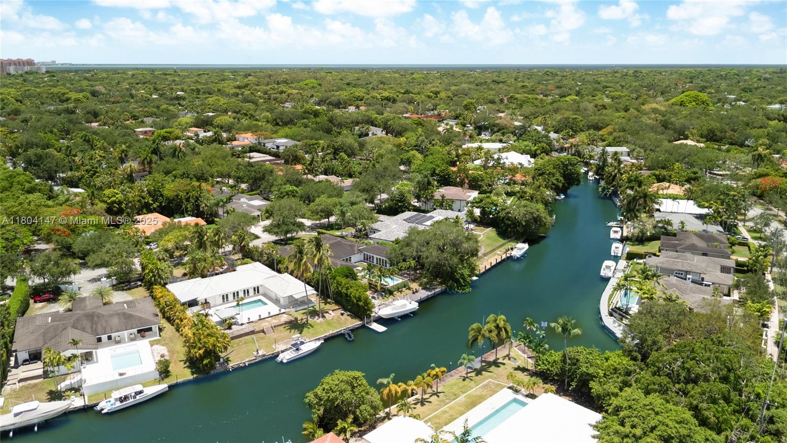Tucked away on one of the city's most serene streets and in a prime waterfront location in Coral Gables, this remarkable property offers an unmatched living experience. With over 118 feet of waterfront and easy ocean access thru scenic Mahi Waterways, you'll be living minutes from the sea. Situated on a spacious 19,627 sq. ft. lot, the possibilities are endless. Whether you choose to renovate the existing 3,191 sq. ft. home with four bedrooms and four en-suite baths, featuring an L-shaped layout, or create your dream home from scratch, there is ample space to bring your vision to life. Perfect for boating enthusiasts eager to explore the golden waters at a moment's notice. Sold As is. Please for offers use only the latest version FARBAR-ASIS-7 Rev.12/24.