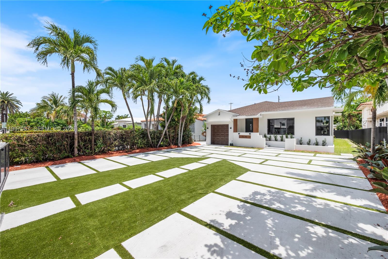 Completely reimagined from top to bottom, this 4-bedroom South Beach residence has undergone a full-scale renovation with every inch thoughtfully redone, including a new roof, upgraded systems, modern finishes, and impact windows and doors throughout. The result is a turnkey home with a clean, contemporary feel and exceptional attention to detail.

The gourmet kitchen features premium KitchenAid appliances, oversized stone countertops with dramatic 3-inch edge detailing, custom lighting, and sleek integrated finishes designed for both style and functionality. Bathrooms have been fully renovated, while upgraded plumbing, electrical, lighting, AC, and exterior improvements add peace of mind and everyday comfort.

Set in one of South Beach’s most desirable and walkable locations, you’re just moments from Lincoln Road, Sunset Harbour, the Convention Center, Miami Beach Golf Club, top dining, and the beach. Enjoy the rare combination of privacy and proximity—where everything you need is just a short stroll away.