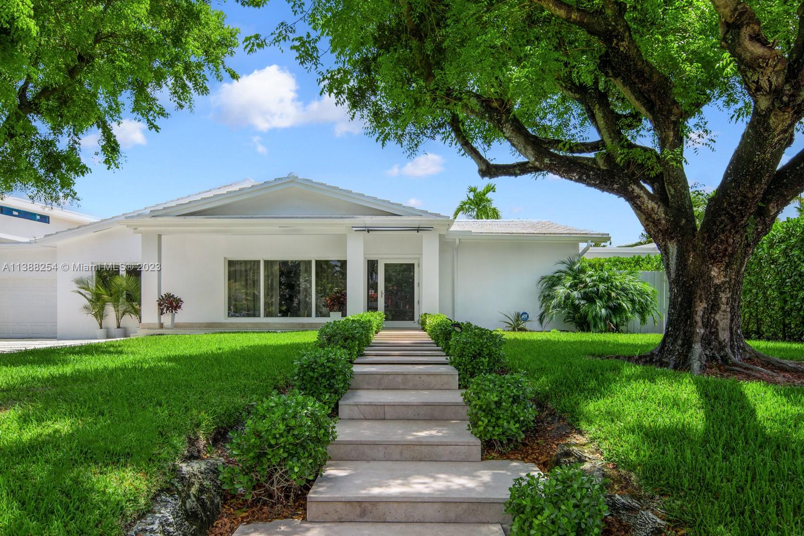 Fully renovated waterfront home in Miami's exclusive guard gated neighborhood of Belle Meade. Enjoy direct water access to Biscayne Bay with no bridges! This one of a kind property sits on a 12,739 SqFt lot with 55 ft of water frontage great for any boater.
The gorgeous 3 bdrm, 3 1/2 bath includes a master stateroom with terrace access and garden/pool view.  Modern architecture with an amazing layout that is great for entertaining, offering a large open kitchen and living space, heated pool, large covered summer kitchen area, private driveway and enclosed garage.
Minutes away from Design District and Miami's top rated private schools.