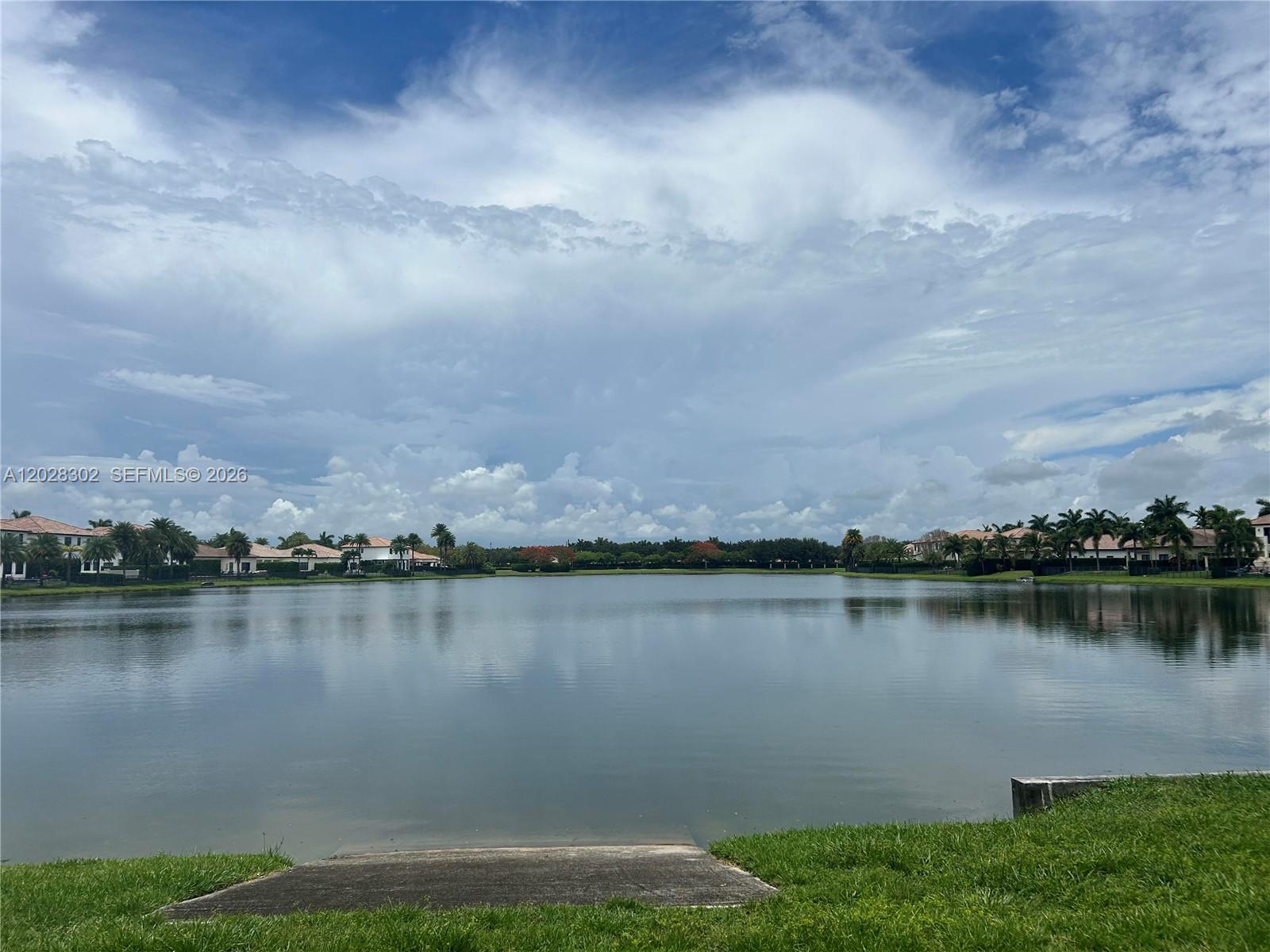 Beautiful waterfront townhouse located in the highly desirable Cascada Isles at Monterra in Cooper City, one of Broward County’s most sought-after communities known for its top-rated schools and strong neighborhood appeal. Built in 2013, this 4-bedroom, 2.5 bath home offers a bright open concept layout with high ceilings, abundant natural light, and a seamless flow designed for both comfortable living and effortless entertaining. The kitchen features granite countertops, ample cabinetry, and a functional island that opens to the main living and dining areas, perfect for entertaining. Large windows frame serene lake views, creating a peaceful and inviting atmosphere throughout. The primary suite offers a private retreat with ample closet space and en-suite bath overlooking the water allowing plenty of natural light. Enjoy indoor outdoor living with tranquil water views and a setting that enhances both relaxation and everyday living, with a gated porch. This home also has a two-car garage, driveway parking, as well as guest parking. Located near parks, shopping, dining, and major highways, and zoned for highly regarded Cooper City schools, this home is ideal for families, first time buyers, or investors seeking a move in ready waterfront property in a prime location.