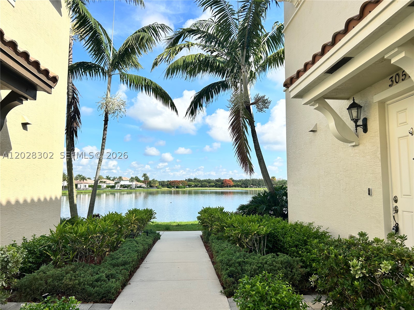 Beautiful waterfront townhouse located in the highly desirable Cascada Isles at Monterra in Cooper City, one of Broward County's most sought-after communities, known for its top-rated schools and exceptional family-friendly lifestyle. Built in 2013, this rare 4-bedroom, 2.5-bath residence offers a bright, open-concept floor plan with soaring ceilings, abundant natural light, and picturesque lake views throughout.
The spacious kitchen features granite countertops, ample cabinetry, and a functional center island that seamlessly opens to the living and dining areas, making it ideal for both everyday living and entertaining. Large windows showcase tranquil water views, creating a peaceful and inviting atmosphere.
The primary suite serves as a private retreat with generous closet space, an en-suite bath, and beautiful waterfront views. Enjoy indoor-outdoor living from the gated porch overlooking the lake, perfect for morning coffee, family gatherings, or relaxing at the end of the day. This home is also uniquely distinguished as the only property in the community with a paved walkway leading to the water, adding both convenience and curb appeal.
Additional features include a two-car garage, driveway parking, and ample guest parking. Ideally located near parks, shopping, dining, and major highways, and zoned for highly regarded Cooper City schools, this move-in-ready waterfront home is perfect for families, first-time buyers, or investors!