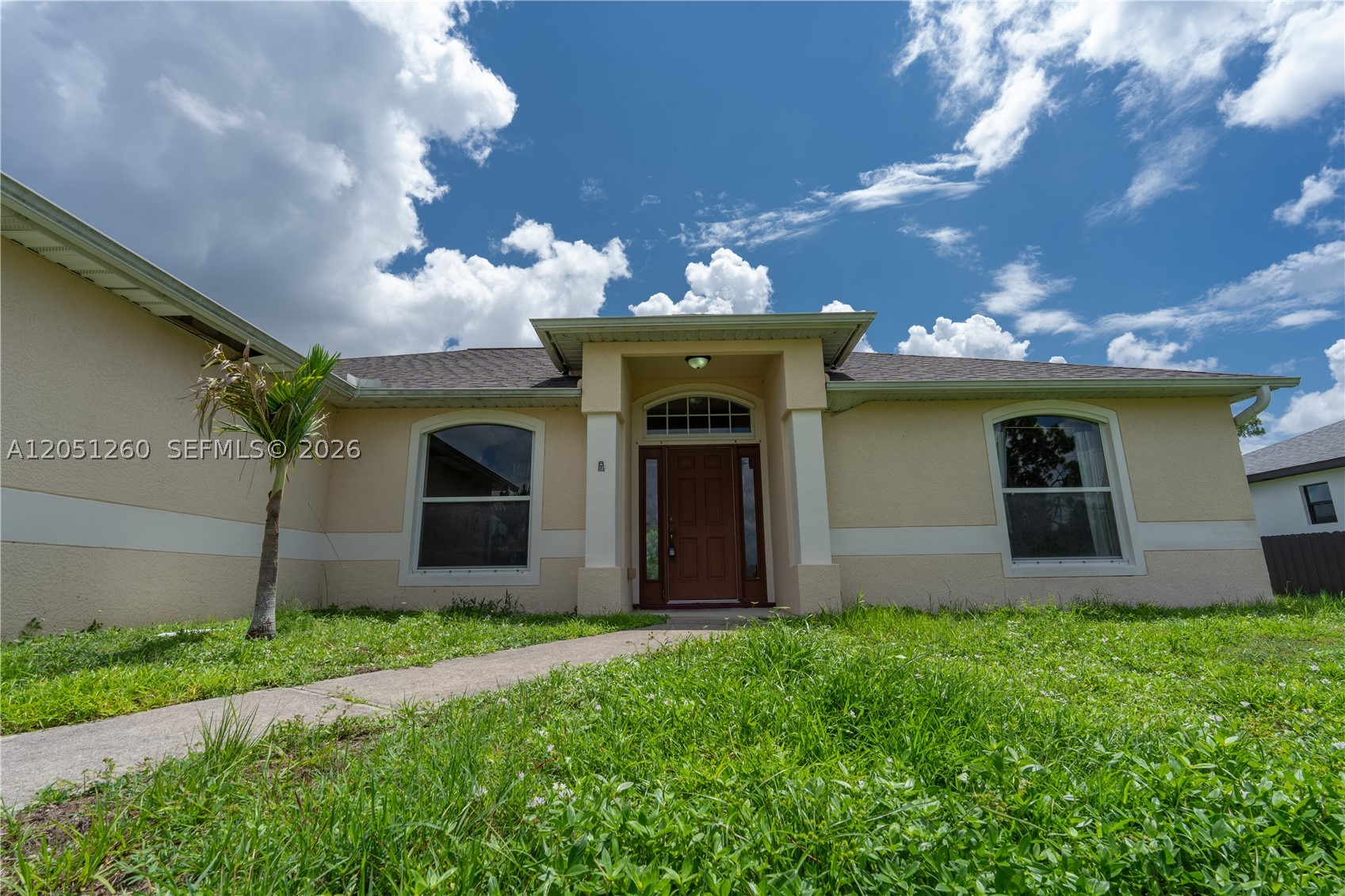 Welcome to this beautiful single-story home located in one of the fastest-growing areas of Cape Coral! This well-maintained residence offers 3 bedrooms, 2 bathrooms, and a spacious open layout designed for both comfortable everyday living and entertaining. The home features a bright living area, a functional kitchen, a 2-car garage, and sits on an oversized lot of approximately 10,000 sq. ft., providing plenty of outdoor space for future additions, gardening, or recreation. Built with durable concrete block construction and equipped with hurricane shutters, this property offers peace of mind and lasting value. Best of all, there is NO HOA, giving you the freedom and flexibility to truly make this home your own. Conveniently located near schools, shopping, dining, parks, and with easy access to major roads, this home is ideal for first-time buyers, growing families, or anyone looking to enjoy the Florida lifestyle. Schedule your private showing today!