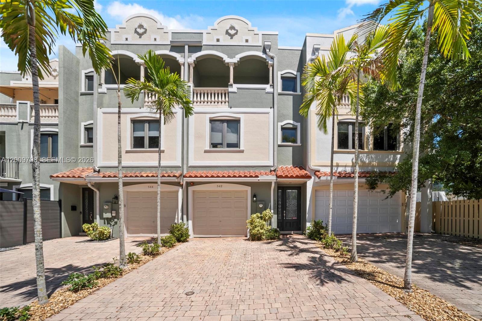 Sophisticated design meets everyday comfort in this luxurious multi-level 3BR + den/office, 3.5BA, 1 car garage, townhome in sought-after Victoria Park, featuring a private backyard oasis with salt system / heated pool, built-in grill, fridge, bar, and travertine pavers. Enjoy indoor/outdoor living from the bright and NEWLY UPDATED KITCHEN with SS appliances, Quartz counter tops and walnut cabinets. Home has its own ELEVATOR to access all three floors. Every bedroom has its own bath; two upstairs bedrooms offer private balconies on the 3rd floor. The 2nd floor includes a spacious primary suite, den/office, and full laundry room. Exterior includes awnings, re-coated roof, and more. Quiet sought after Victoria Park neighborhood, minutes to Las Olas, beaches, and top dining. No HOA