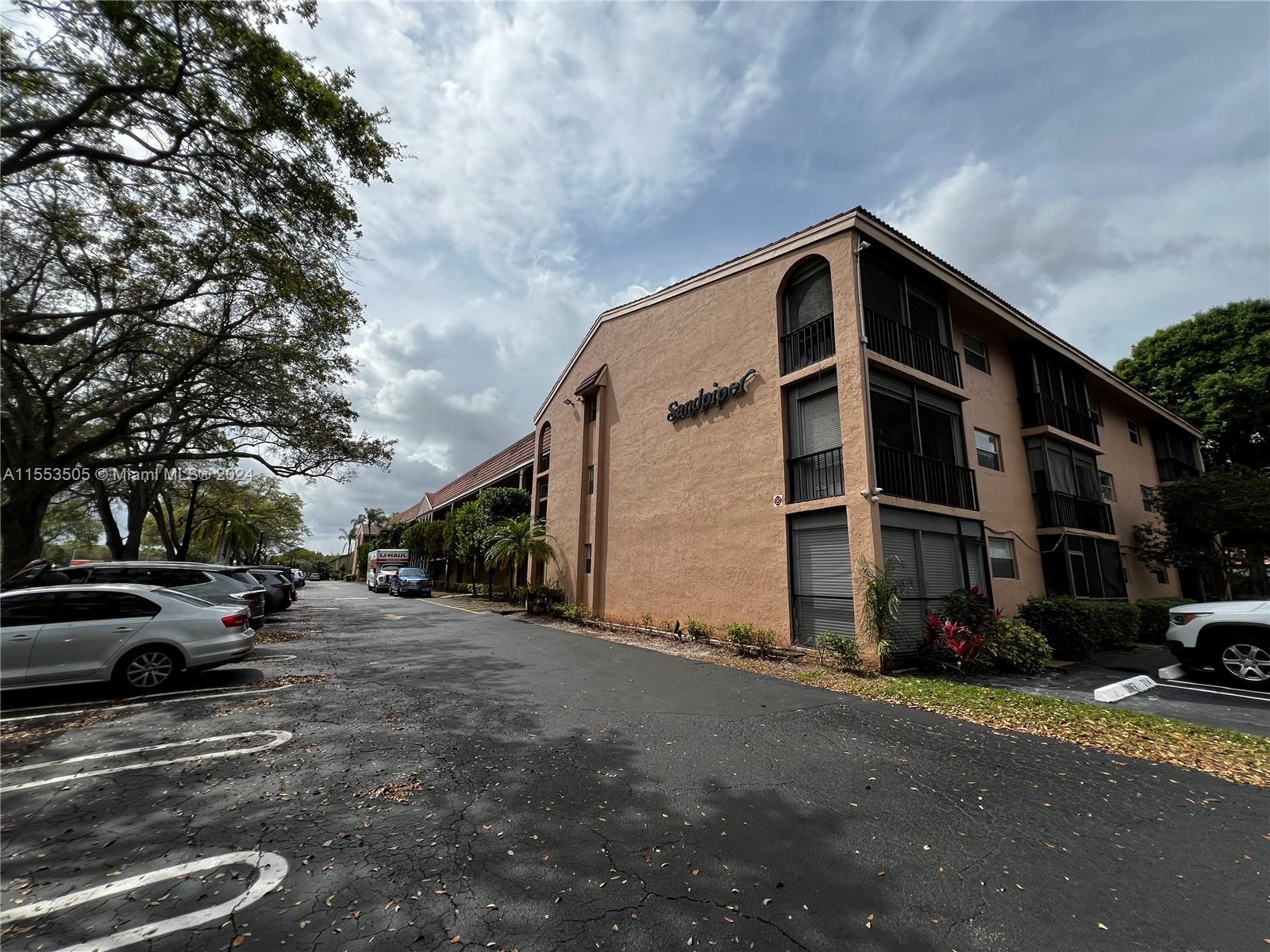 Priced to Sell. Rarely available, large condo located in Coral Springs. ALL AGES WELCOME! 2 bedrooms, 2 bathrooms, and washer/dryer inside. Sought-after Sandpiper building in a fantastic location across the Fire and Police Departments and very close to the Coral Springs Center for the Arts, Museum and park complex. Building got a new roof, new elevator and parking lot re-paved during 2023. Very large main bedroom with big walk-in closet, lots of storage space throughout, spacious kitchen. One assigned parking space and guest parking. No commercial vehicles allowed. Nice community pool. 25% down payment required. Seller will pay the current Special Assessment at closing. Excellent walkability to great assortment of restaurants, stores, medical offices, Hospital and more.