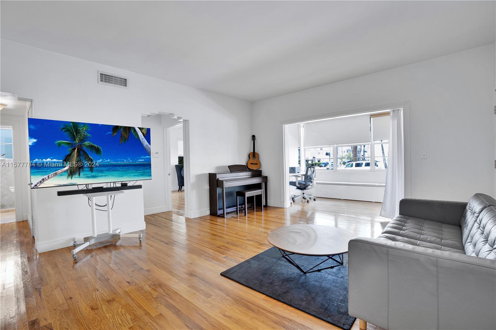NO Condo -HOA Fees. Unique home or investment opportunity in the heart of South Beach . Just under 1,200 sq ft 2 Bedrooms 2 Baths, fantastic large dine-in kitchen , spacious living room with Sunny Bonus room for office, playroom, formal dining. Hurricane Impact Windows, Solid wood floors updated kitchen & bathrooms with washer/dryer in unit & off street parking space plus communal outside area. New AC this year. Unit offers your own front and back door with Ramp Access. Only 4 units in the building. Building passed 40 year recertification.