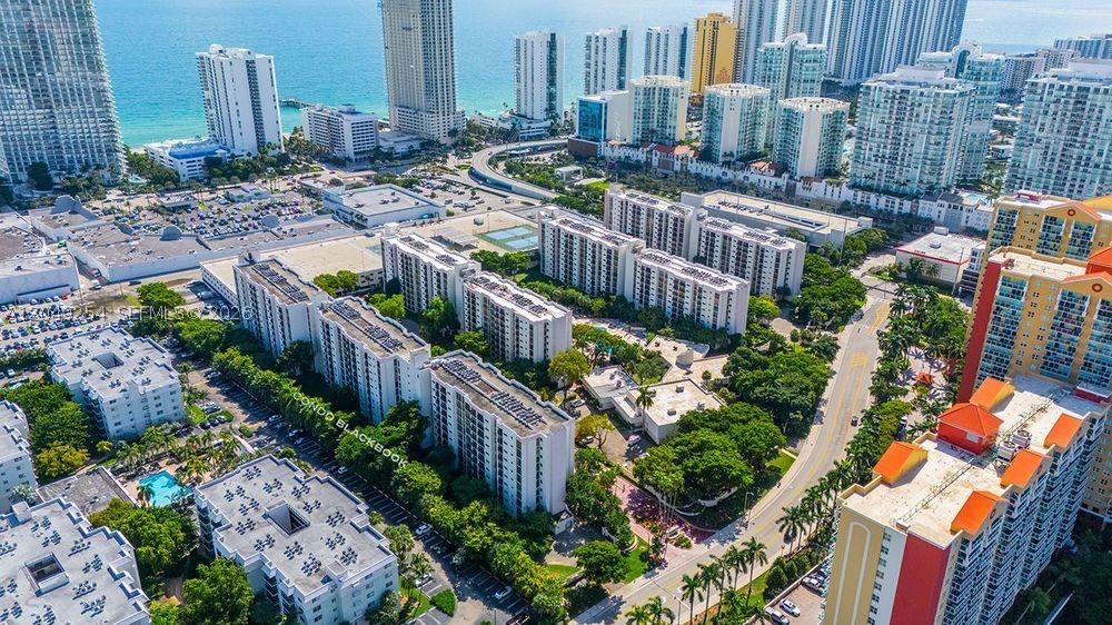Spacious and well-maintained 1-bedroom, 1.5-bath condo in the heart of Sunny Isles Beach, ideally located between the Atlantic Ocean and the Intracoastal Waterway. Enjoy the ultimate South Florida lifestyle with the beach just a short walk away, along with an array of restaurants, cafés, shopping, parks, and entertainment options. This bright and inviting residence offers a functional layout with generous living and dining areas, ample closet space, and a private balcony perfect for relaxing after a day at the beach. The gated community features an impressive selection of resort-style amenities, including a heated swimming pool, a brand-new fitness center, a sauna, tennis and basketball courts, a BBQ and picnic area, a clubhouse with a media/recreation room, and a scenic jogging path. Ideally situated just minutes from Aventura Mall, Bal Harbour Shops, Gulfstream Park & Casino, Oleta River State Park, and both Miami International and Fort Lauderdale-Hollywood International Airports, providing easy access to everything South Florida has to offer. Rent includes internet, cable, one parking space, and full access to all community amenities. A fantastic opportunity to enjoy resort-style living in one of Miami's most desirable beachside communities. Info herein is deemed reliable, subject to errors, omissions, or changes without notice—buyer or buyer's broker to verify all information.