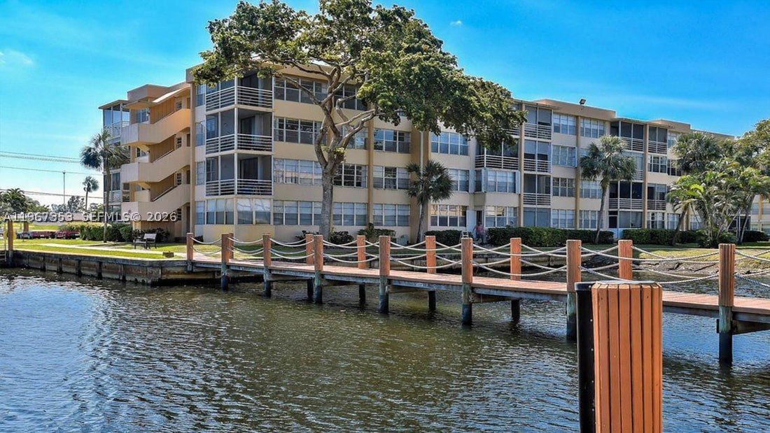 Water, Cable, And pest included in HOA. RENT IMMEDIATELY. No rental restrictions. Great for investors.  Large Corner unit with an expansive screened porch offering extra living space and peaceful views. Brand new appliances and a huge storage space on the same floor. Move right in or rent immediately — investor-friendly! Enjoy two heated pools, a gym, a sauna, tennis courts, a billiards room, a library, BBQ areas, and updated laundry facilities on every floor. Maintenance covers cable, water, and pest control for added convenience. Prime location close to Fort Lauderdale-Hollywood International Airport, only 3 miles to Hollywood Beach, and near shopping, dining, parks, and major highways. Easy to show!