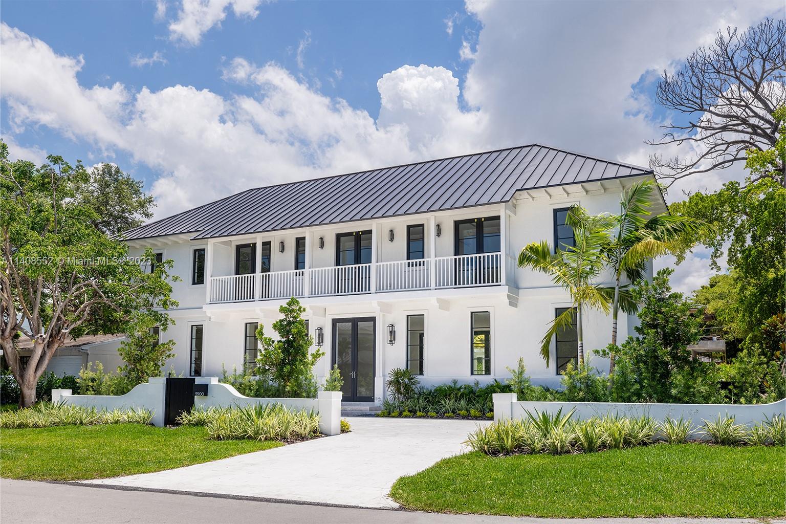Welcome to your brand-new tropical oasis designed by renowned architect, Cesar Molina. This stunning 4-bedroom, 4.5-bathroom home sits on a corner lot and boasts 10’ windows & French doors, white oak flooring, shaded summer kitchen, detached two-car garage, a full home generator, top-of-the line appliances, and all natural stone surfaces. The kitchen features custom millwork and paneling, two large waterfall islands, and beautiful bronze hardware. Outside, immerse yourself in your own personal paradise with the sparkling pool, surrounded by lush greenery, providing the perfect backdrop for both lounging and entertaining. This brand-new construction home offers all of the latest features in sophistication and comfort.  Contact us today to schedule a tour.