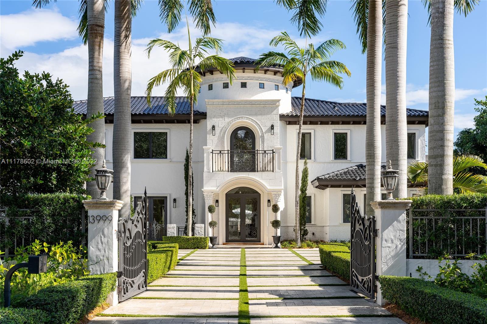 Exquisite, gated 2-story estate located on the iconic Old Cutler Road. Newly updated turnkey home exudes luxury w/ high-end finishes, designer furnishings, impact doors/windows, & lush landscaping. Dramatic 25’ foyer w/Guggenheim-inspired white spiral staircase & honed white porcelain floor. Living room opens to dining room w/ double height ceilings & wood-burning fireplace. Chef's kitchen, open to family room, w/ Viking appliances, panda marble accents, large island, & breakfast nook. Large primary suite w/ expansive terrace. Add'l guest room, home office, laundry room & wine room complete 1st floor. 2nd level has 4 large en-suite bedrooms w/ walk-in closets, home theater, open rec room w/ terrace. Heated pool + spa, outdoor kitchen, putting green & grounds w/3 exotic fruit trees.