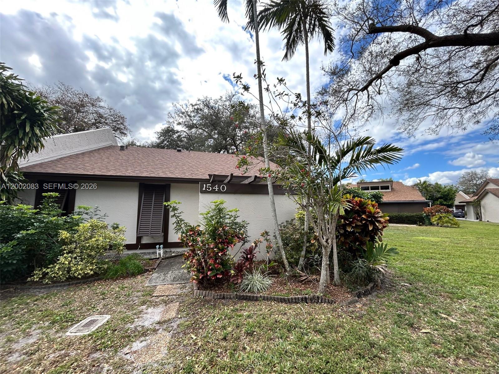 This is an end corner unit with a new roof installed October 2023. Outside electric panel was replaced in 2022. AC installed 2008, but rarely used. HOA Fees are $130.00 per month. Patio is screened and great for outdoor entertainment. If you are in the market to purchase your home in Pembroke Pines, then put this property on the short list. Well maintained community with Management office on-site. This community is close proximity to shopping, dining, medical, houses of worship, and easy access to major highways to take you to Miami, Ft Lauderdale, or Naples. Enjoy driving through this tranquil community with lakes, green open spaces and mature oak trees. Pictures are great, but you really need to come and see this property. Come and imagine how you can make this your home today. All closings must be in owners name, not corporation, LLC, etc. One full year advance dues, $1,560.00, is required to be held in escrow at closing. No renting for 3 years after closing.