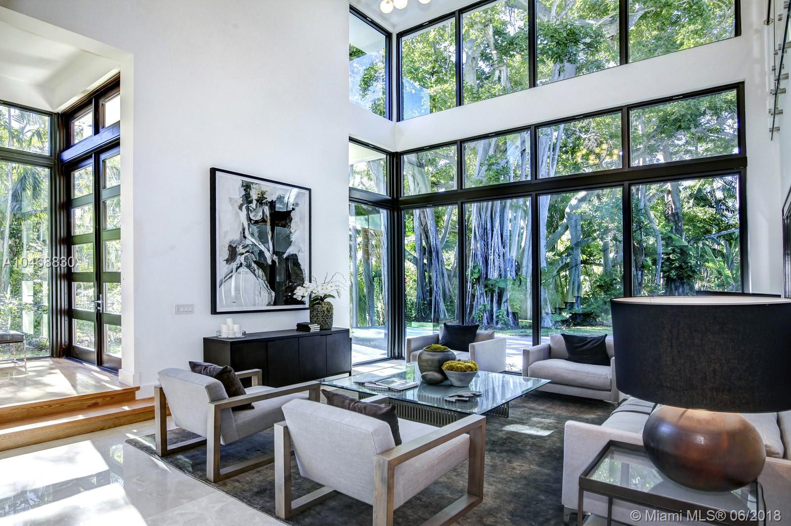 This brand new contemporary masterpiece is located on a tranquil street only minutes from the center of beautiful South Grove and the shops of Merrick Park. It offers a superb floor plan comprising six bedrooms, seven full bathrooms, and a powder room. The property conveys the sensibility of being outdoors, due to its floor to ceiling windows overlooking the lush landscape of Coconut Grove. The interior space was meticulously designed and luxuriously appointed with marble and solid wood floors. Nowhere else can one experience a lifestyle such as this.