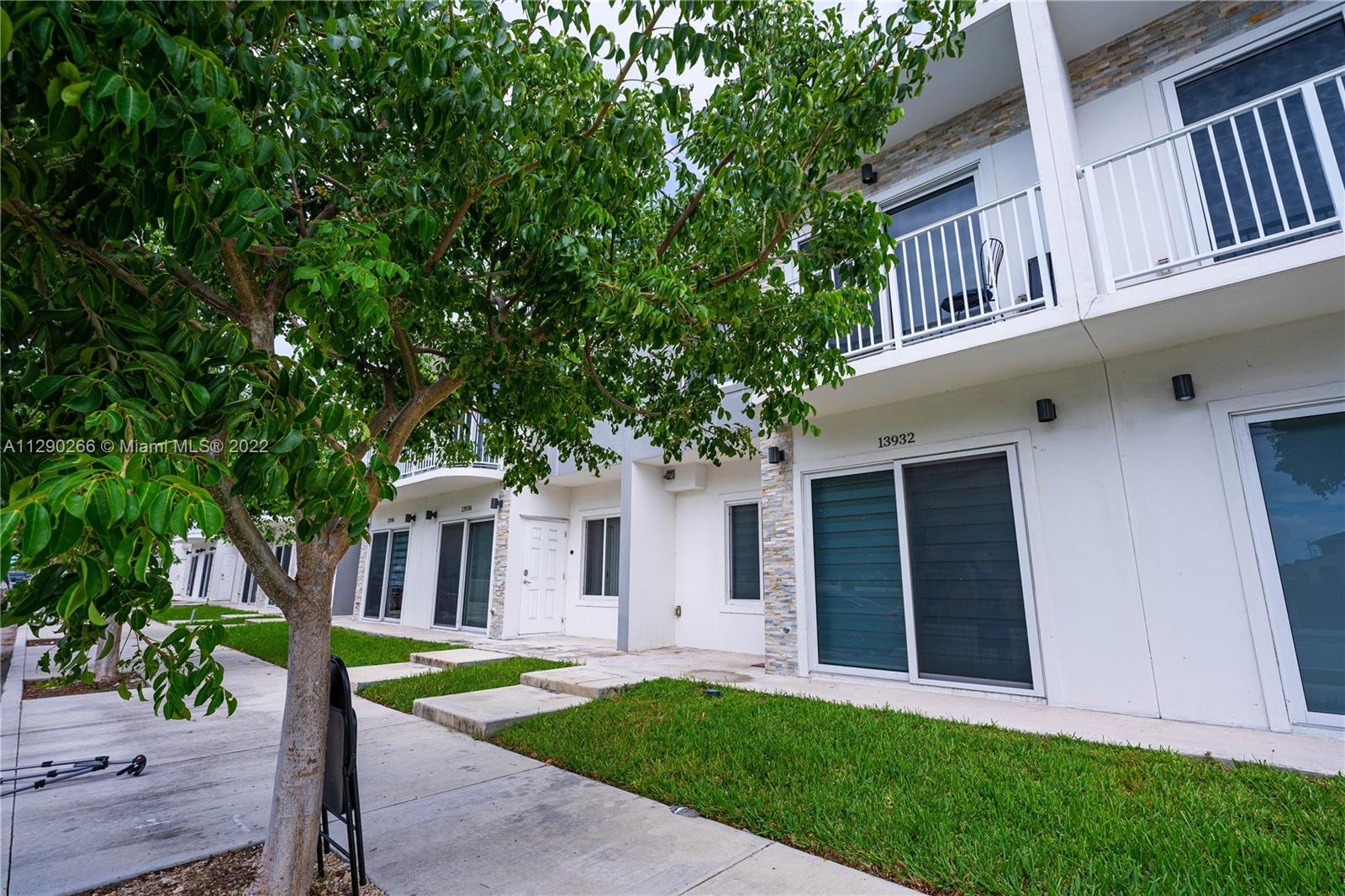 Newer built townhome in a modern and centrally located community. Featuring 4 bedrooms, 3.5 baths, fenced private patio, 2 parking spaces and plenty of visitor parking available. The structure is made of concrete, impact windows, porcelain floors downstairs and water proof vinyl in the 2nd floor. Open kitchen with quartz counter tops, solid wood cabinetry and SS appliances. Two master bedrooms with walk-in closets, LED lighting throughout and tankless water heater for optimal energy efficiency. Low HOA, no CDD and FHA eligible. Call listing agent for more.