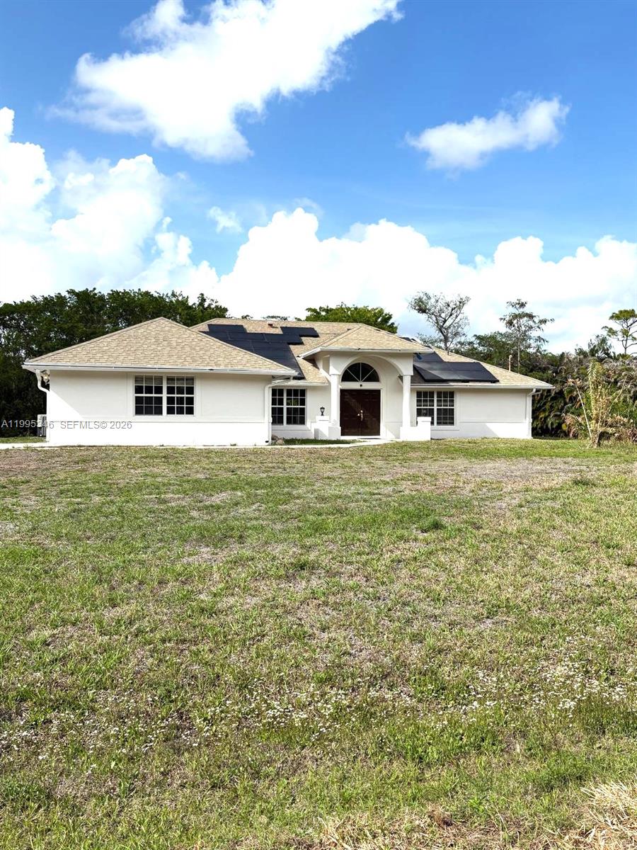 Spectacular Single Family Residence featuring 1.14 Acres Lot with 5 bedrooms, 3 bath, formal dining room, living room and family room, put 180K MODERN Designed Renovation, Modern Chandeliers, Huge Kitchen Island can set 10-12 people with Golden Accessories, Faucet and Sink, Modern Range hood with untouched performance-voice control and hand sensing control.  Master bathroom embrowned with Golden accessories with electric smart toilet with the sensor, each bathrooms has their own design style, and three bathrooms have Led Mirrors, the garage can be used to game room or can change to suit, 31K solar panel is feeding the house, original roof treated for rejuvenating, municipal water supply,  AC 2022, water heater 2019. Close to Publix, Malls, Safary Loin Zoo and other entertainment, Excellent schools. NO HOA