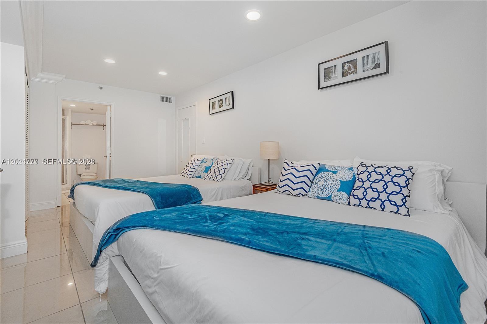 Enjoy living in the classic Alexander Condo with no rental restrictions and direct beachfront access!!. Fully furnished and SUITABLE FOR A FAMILY UP TO 10 MEMBERS OR 2 FAMILIES. The best price for a unit with 2 HUGE bedrooms in each side of the unit for more privacy furnished with 2 FULL BEDS each and 2 completed bathrooms. Totally renovated and well maintained. Cable, wi-fi, electricity, hot water, valet, pool, gym and more included in the maintenance. Resort experience, fast approval, easy to show.
