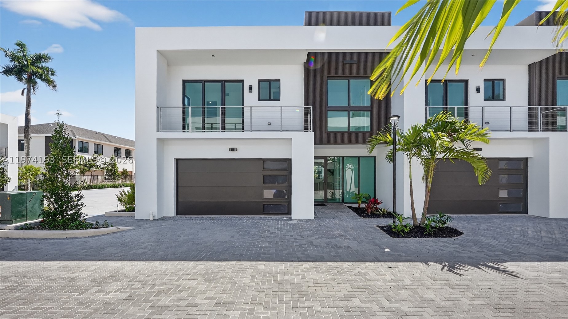 MOVE IN READY CORNER UNIT! Introducing H2O Dania, a newly delivered, gated townhome community in Dania Beach featuring just 11 modern residences with starting prices from $990,000. This boutique new construction development offers multiple layouts, contemporary architecture, and elevated finishes throughout. Four residences include deeded boat slips accommodating vessels up to approximately 32 feet, offering a rare opportunity for canal-front living. Photos shown represent one of the available layouts. Ideally positioned minutes from Fort Lauderdale Airport, beaches, marinas, Dania Pointe, major highways, and nearby places of worship. Limited inventory! Private, in-person tours available at the on-site sales center. SCHEDULE TODAY!
