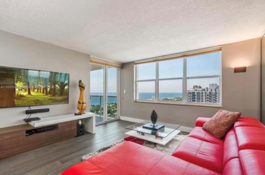 Experience a refined lifestyle in this elegant, fully renovated 2-bedroom, 2-bath penthouse. Located on the top floor of a prestigious building, this home offers unparalleled privacy and stunning, unobstructed sunset views from every room. The split-bedroom floor plan and spacious layout create a comfortable and private retreat. A fully updated kitchen with quartzite countertops and updated fixtures makes a statement of modern design. Custom closets in both bedrooms offer abundant storage.