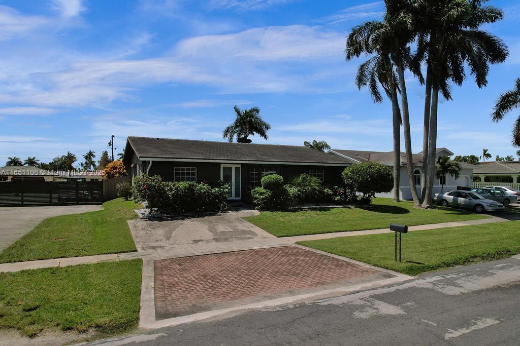 Beautiful POOL home with 2000 SF of pure comfort on approximately 1/4 acre lot! Room for a growing family. This home has it all! Beautiful kitchen with cooking island, wood cabinets, granite tops, stainless steel appliances, family room with French doors overlooking the patio and BRAND-NEW POOL with pavers all around. Room enough in the backyard to install a tiki, hut, spa, outdoor kitchen, pickleball court, basketball, etc. Huge yard, completely fenced, 2 driveways! The one in the back can hold 3 RV's, boats, cars, toys of any kind! Also, a 1 car attached garage. Easy drive to Fort Lauderdale airport, downtown Fort Lauderdale, casinos, shopping, dining. The beach is ess than 2 miles away. Family friendly neighborhood. Good schools are less than 1 mile away. This is a must see!