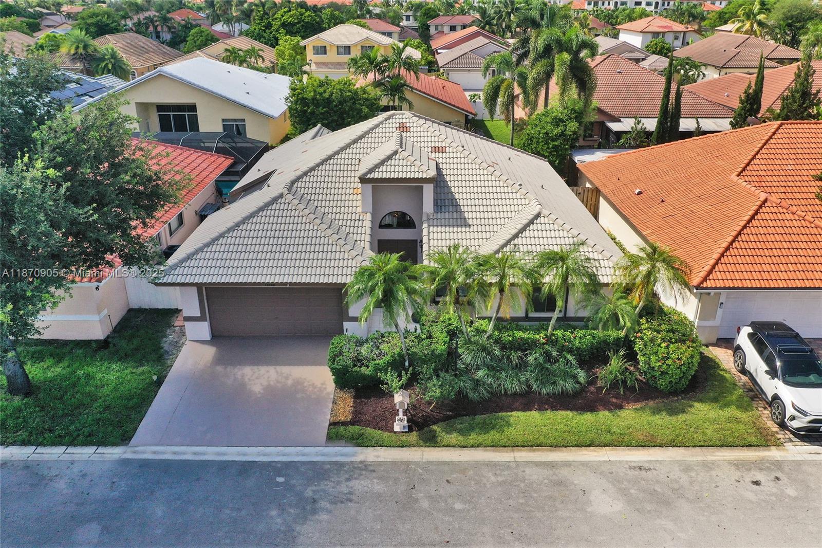 Welcome to this hidden gem neighborhood with only 171 homes....Eagle Creek!  This most popular Ambassador model is a one story home that consist of 3 bedrooms, 2 bathrooms, 2 car garage, a screened patio overlooking a professionally lushly landscaped property and an atrium!  Interior features: double door entry into a wide foyer, cathedral ceilings in the main living area plus the master suite. Plenty of storage space and you will be pleasantly surprised with the oversized master closet.  The master bath has dual sinks, roman tub with a separate shower. Enjoy the split bedroom plan, interior washer/dryer closet, plantation shutters in the eat in kitchen, tile in the main living area with carpet in the bedrooms. Exterior is completely hurricane protected, completely fenced in yard.