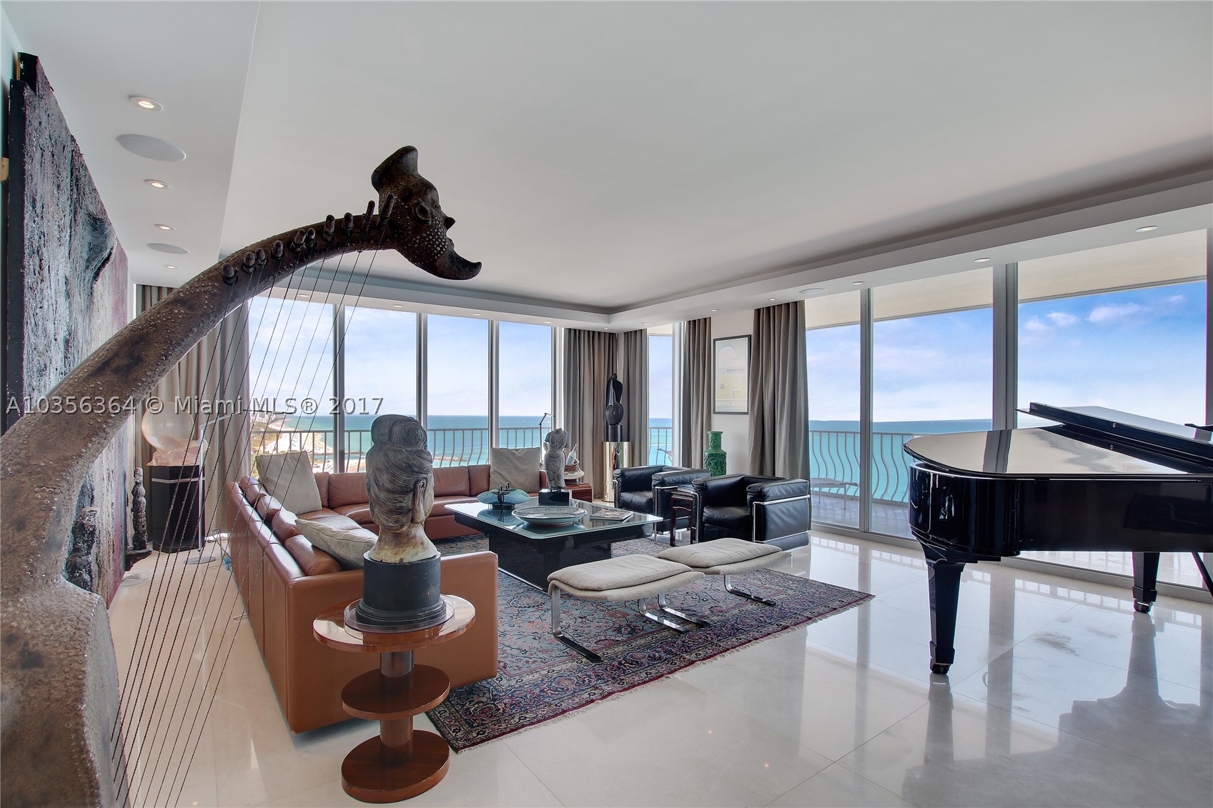 Penthouse apartment with breath taking views of the ocean located in the heart of prestigious Bal Harbour. This
gorgeous and spacious masterpiece was completely renovated in 2015. The renovation includes re-designed
floorpan, new electrical, new plumbing, new AC Hvac units, 36x36 marble flooring throughout, Quartz and Onyx
counter tops, custom built grain-matched walnut cabinetry and much more A poolside cabana with full
bathroom also included. Building just completed a major renovations. 1 Assigned Parking Space & 1 Valet
Parking.