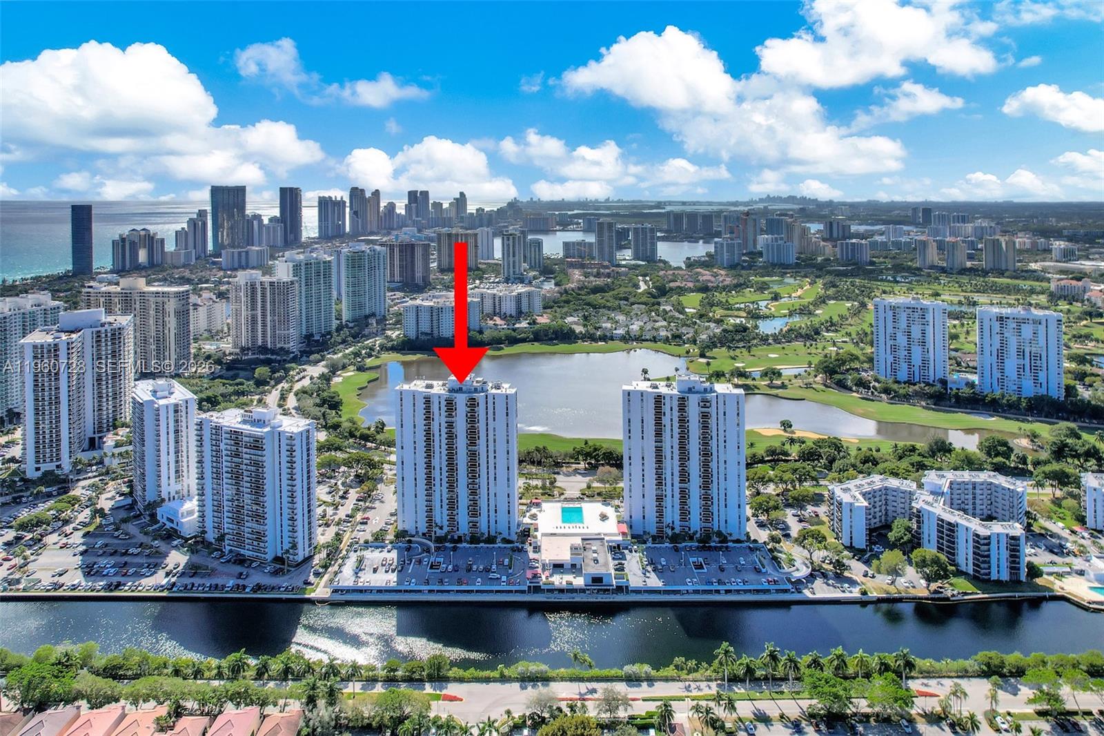 Wake up to breathtaking sunrise views—ocean + golf course scenery that feels like a daily vacation. This is Aventura living at an exceptional value, featuring a large balcony perfect for morning coffee and bay breezes. All current assessments are paid, offering peace of mind. Prime location close to everything: Aventura Mall, beaches, top restaurants, Publix, A-rated schools, Brightline, and easy access to major highways. Secure and well-maintained community with 24-hour security and concierge, plus resort-style amenities including pool, jacuzzi, gym, sauna, and BBQ area. Spacious 2 bedrooms / 2 bathrooms with tile floors, deeded covered parking, storage unit, and newer A/C (approx. 2 years).