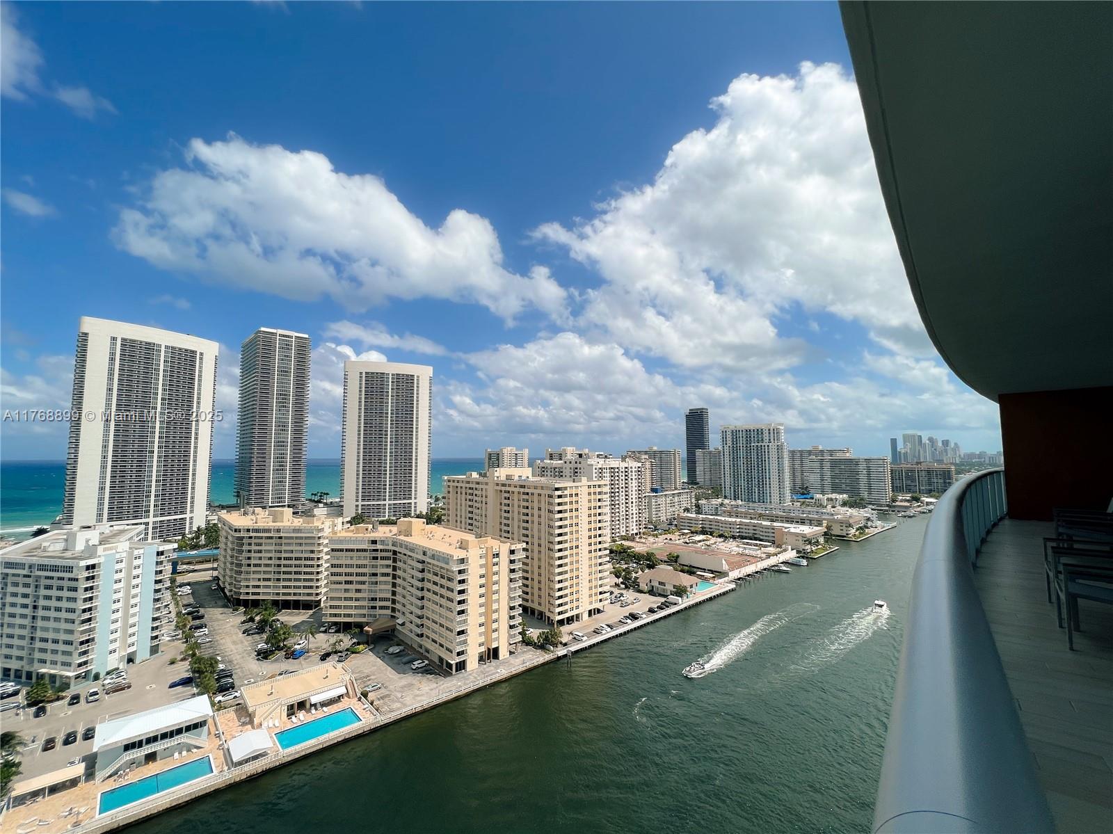 WATERFRONT CONDO – AIRBNB & SHORT-TERM RENTAL. 3-bedroom, 3-bathroom in the Beachwalk Resort designed by Pininfarina in Hallandale Beach on the 22 floor, this corner offers panoramic views of the ocean, Intracoastal, and city skyline from the wraparound balcony 319 Sqft private elevator and 1,711 Sqft of modern living space, this residence features an open-concept layout with high finishes, custom cabinetry, and a large center island. Floor-to-ceiling windows. Amenities include: Two pools, a private rooftop pool, a fitness center & 24/7 security, Valet parking, a restaurant, and more Maintenance HOA includes electricity, water, internet, cable, phone & insurance. No rental restrictions, Airbnb & short-term rentals, and Steps from the beach.