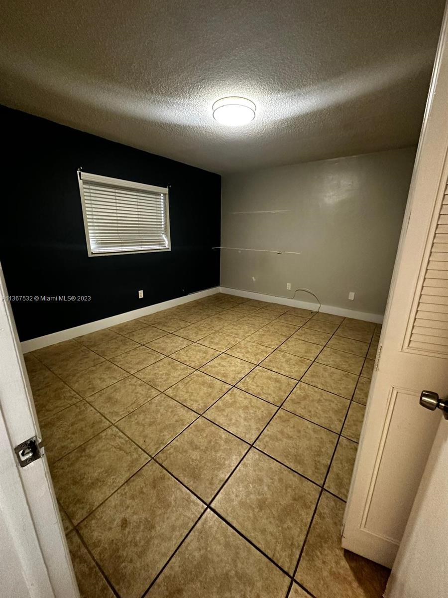 GARSAN APTS INC CONDO - Residential Lease