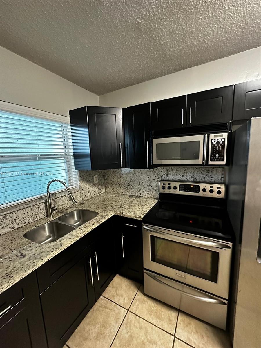 GARSAN APTS INC CONDO - Residential Lease
