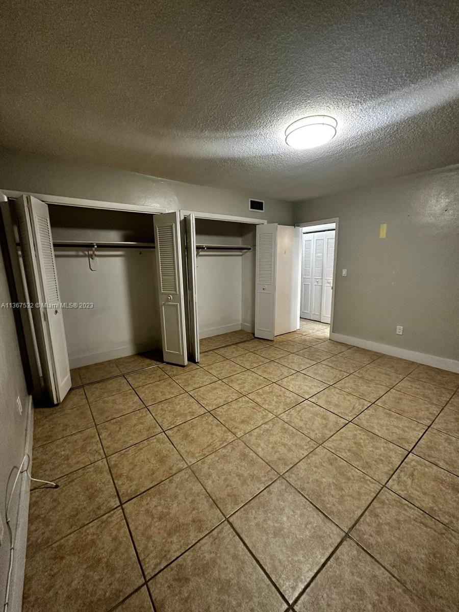 GARSAN APTS INC CONDO - Residential Lease