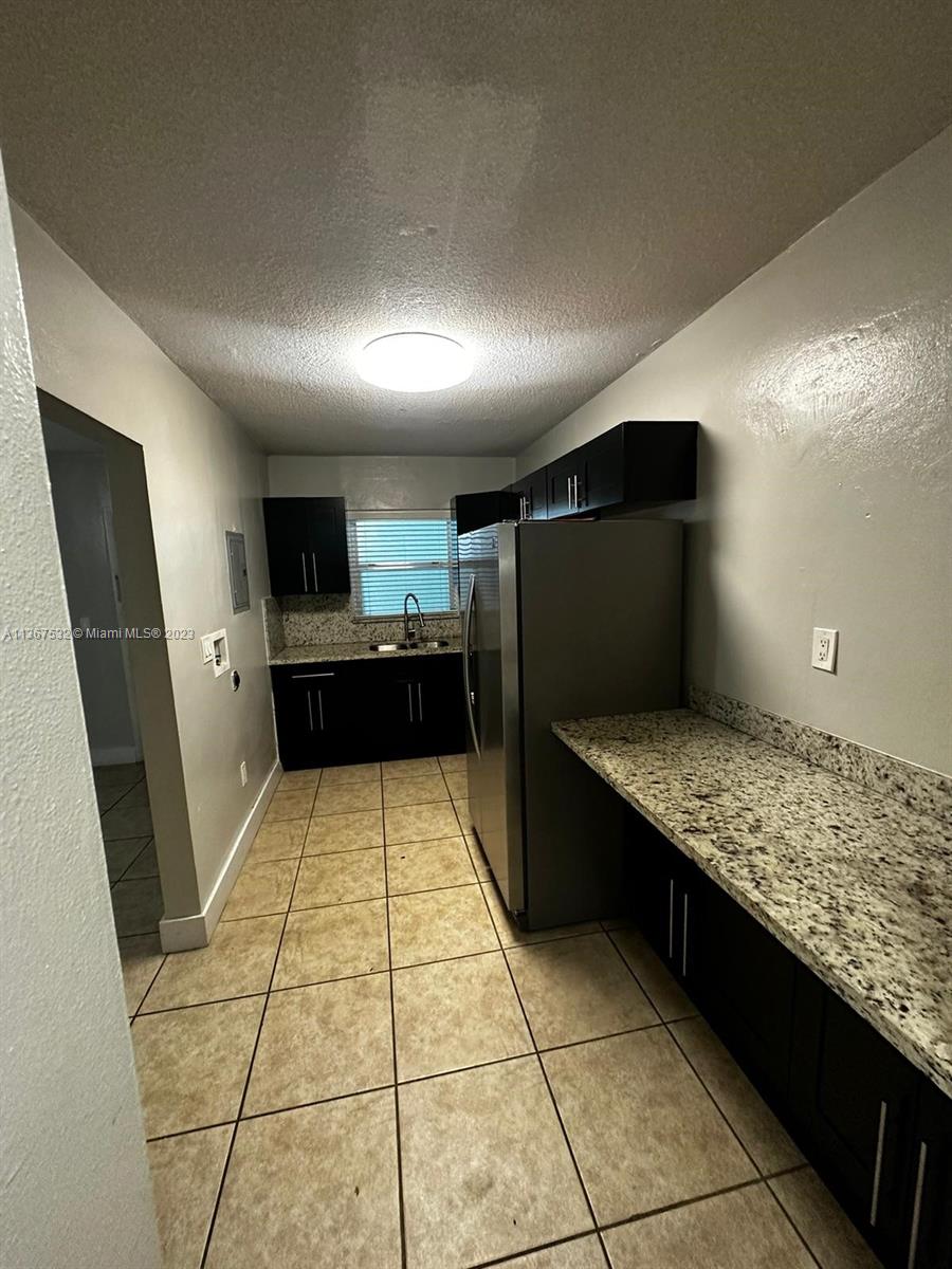 GARSAN APTS INC CONDO - Residential Lease