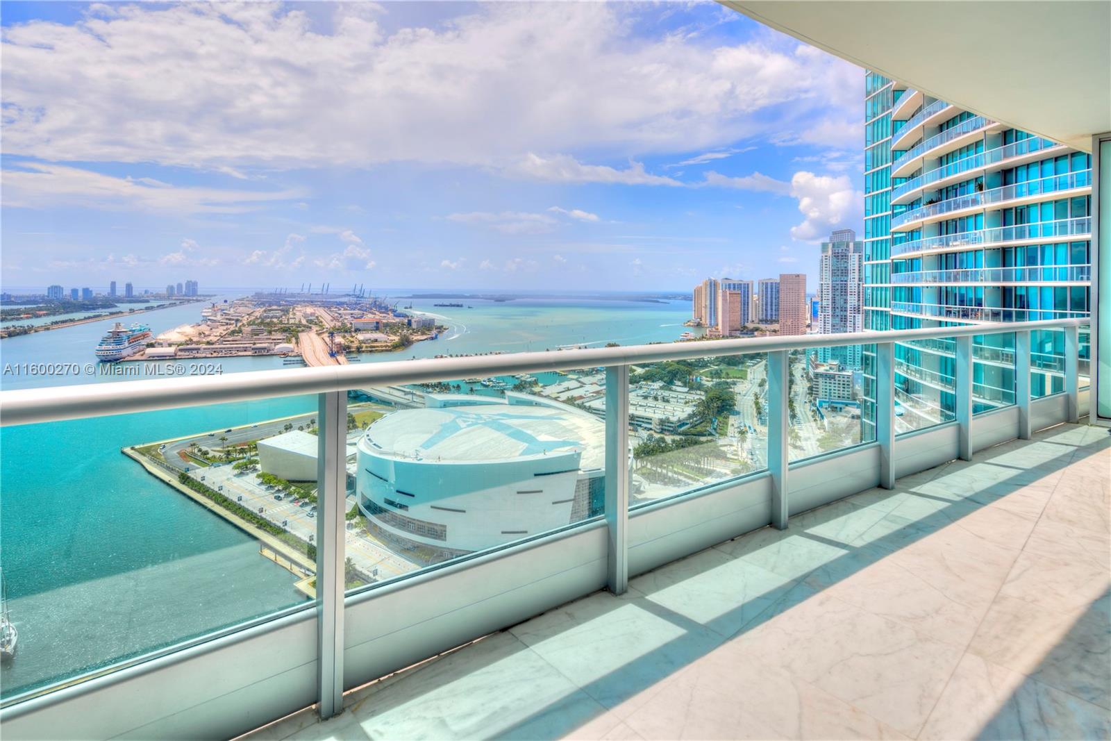 1,006 sq/ft 1 Bed + DEN, 2 Full Bath condo w/direct bay & ocean views. Expansive floor plan, Carrara marble flooring & floor-to-ceiling glass windows. Modern kitchen w/marble countertops & Sub-Zero/Miele appliances. Spa-like master bath w/glass-enclosed shower & soaking tub. Custom walk-in closet. Oversized terrace w/stunning views of Biscayne Bay & Miami Beach skyline. Washer/Dryer in unit. Amenities---2 pools, private theater, fitness center & full-service spa.
