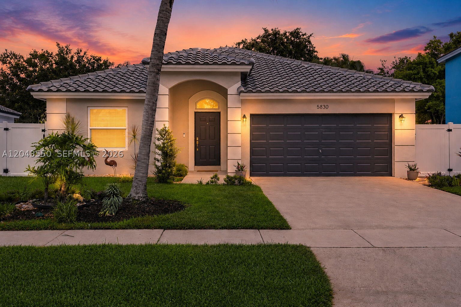 From the moment you enter, soaring vaulted ceilings and abundant natural light create a bright, open atmosphere. This exceptionally maintained 3-bedroom, 2-bath pool home features a NEW Eagle Capistrano barrel tile roof (2025), NEW HVAC (2024), NEW water heater (2025), impact windows with a transferable lifetime warranty, resurfaced saltwater pool (2022) with NEW pool equipment (2025), fresh interior and exterior paint (2025), quartz kitchen countertops, new kitchen sink, new washer and dryer (2026), and a new garage door opener (2025). Located in Stirling Palm Estates with a private tropical backyard, community park, and convenient access to highly rated Cooper City schools, shopping, dining, parks, and major commuter routes.